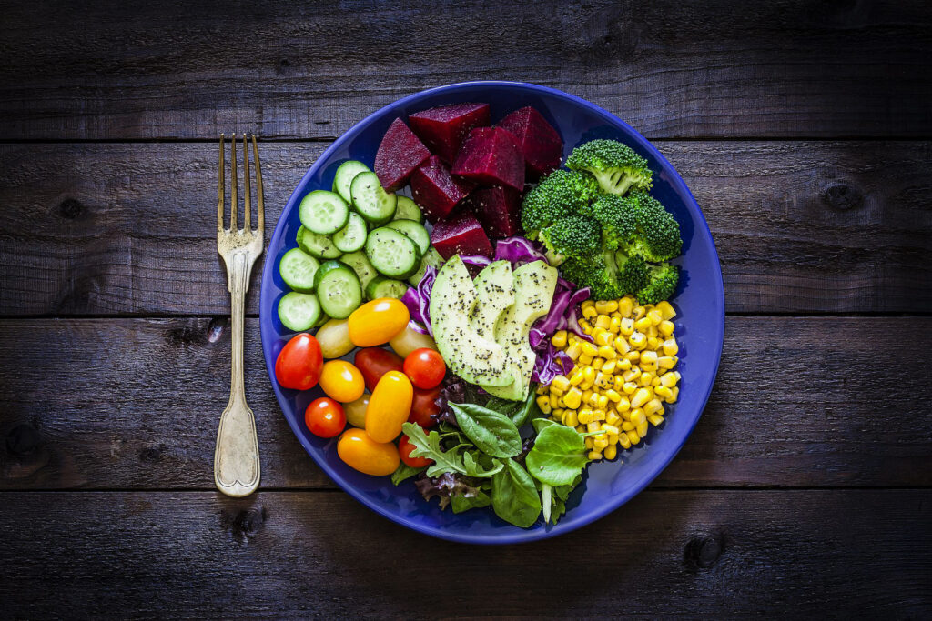 salad mix plate shot from above on rustic wooden royalty free image 1018199524 1556130377